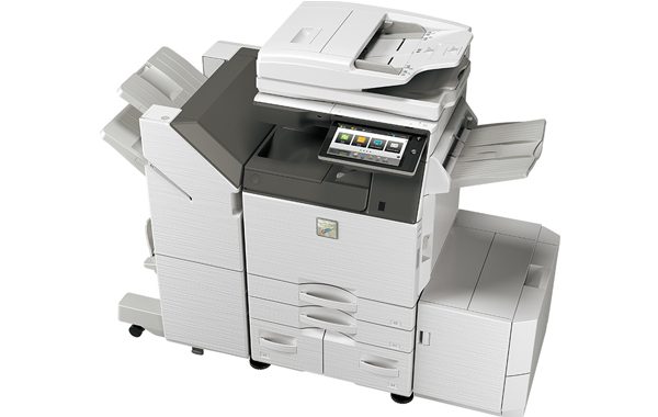 A large, modern Sharp Multifunctional Printer with a touchscreen control panel, multiple paper trays, and various output sections, designed for efficient office use in Los Angeles.
