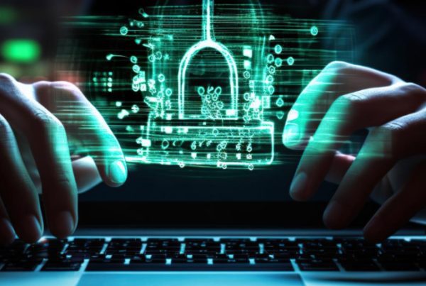 Hands typing on a laptop keyboard with a glowing digital padlock hologram hovering above, representing cybersecurity basics and data protection concepts.