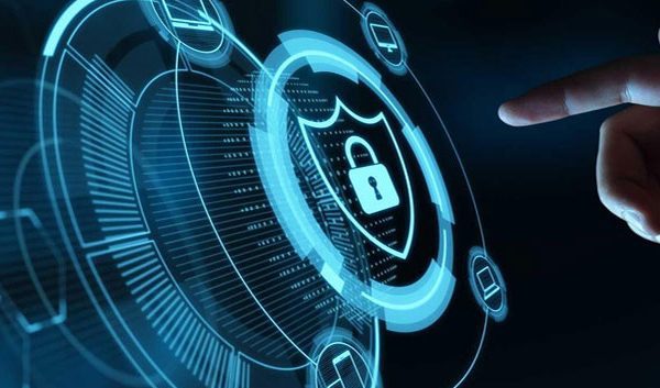A hand reaches toward a glowing digital lock symbol on a futuristic virtual interface, highlighting the importance of cybersecurity and business security in modern data protection technology.