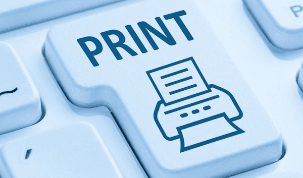 Close-up of a computer keyboard with a large white PRINT key, featuring a printer icon—highlighting the print function and the importance of efficient print management. Surrounding keys are visible but less prominent.