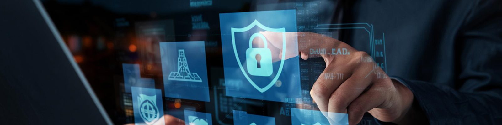 A person interacts with a transparent digital screen displaying various cybersecurity icons, including a shield with a padlock, symbolizing robust business security and online data protection measures.