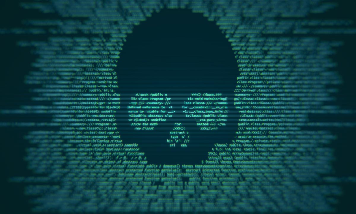 Green computer code forms the shape of a skull on a dark background, symbolizing hacking or a cyber threat. The image highlights cybersecurity risks as the skull emerges from blurred text, conveying the idea of digital danger or malware.