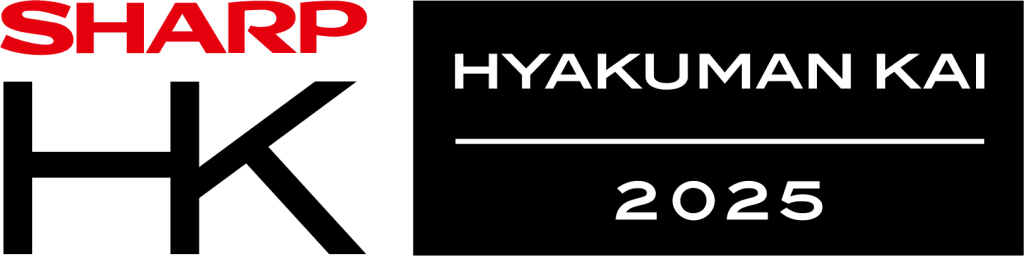 Logo with SHARP in red, large black letters HK below, and a black box to the right containing white text HYAKUMAN KAI above a line, with 2025 below—honoring GoodSuite as a Sharp Hyakuman Kai Dealer recognized for exceptional growth.